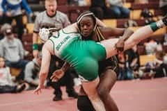 Makenzie Eltzroth gets a takedown in her finals match. [Credit: Cynthia Leota]