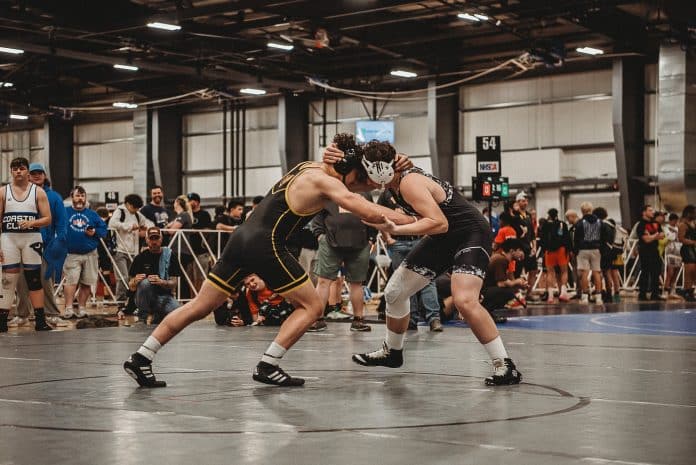 Jeremiah Chavis ties up with his opponent at the 2023 High School National Championship in Virginia Beach, VA.