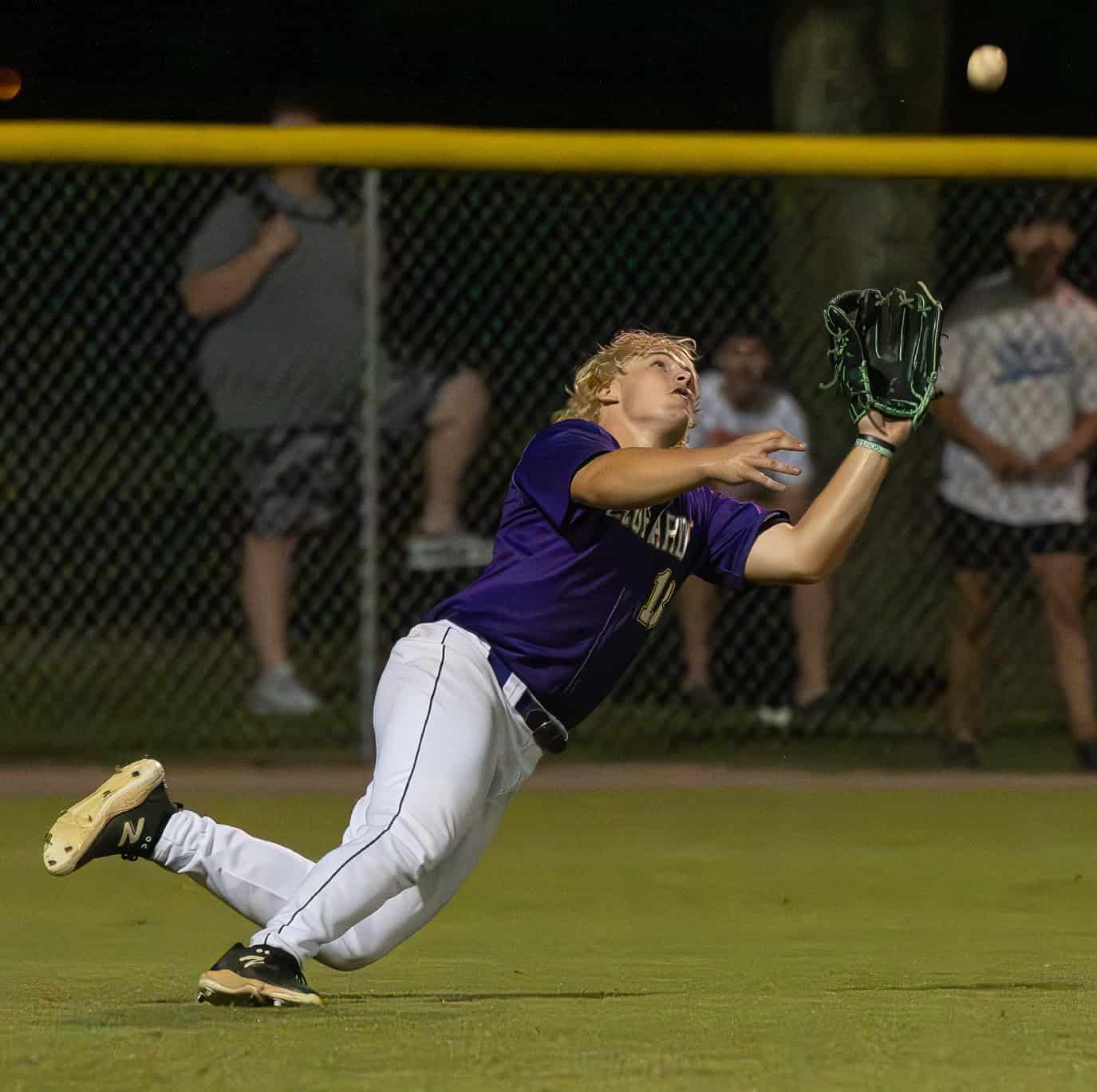 Hernando High’s, 13, Bryce Saltsman was able to make a catch helping to keep the Nature Coast from sustaining a rally in the late innings of the FHSAA 4A Regional semifinal game at Nature Coast. Photo by [Joseph Dicristofalo]