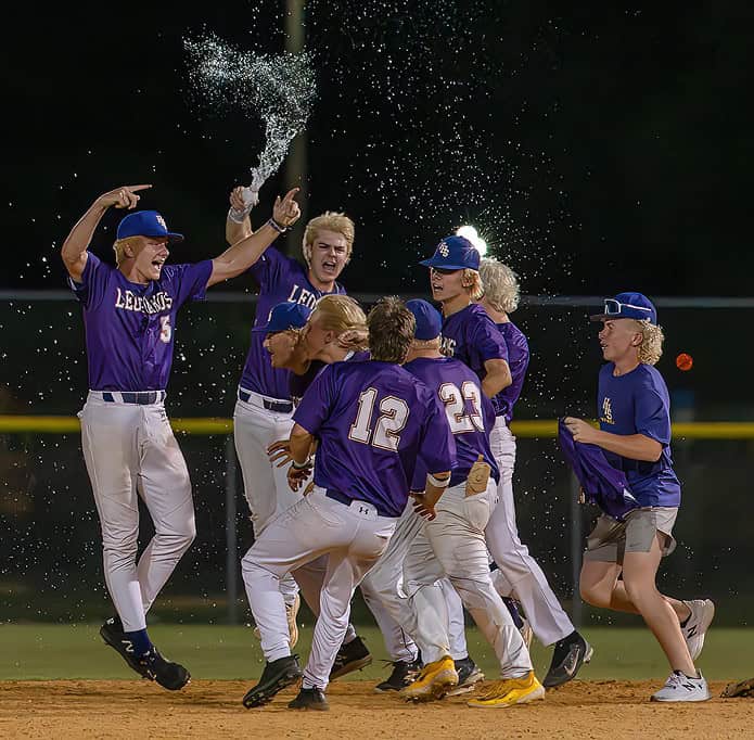 Members of the Hernando Leopards celebrate after the final out in the 7-4 win at Nature Coast Tech in the FHSAA 4A Regional semifinal game. Hernando will take on Merritt Island Tuesday on the road. Photo by [Joseph Dicristofalo]