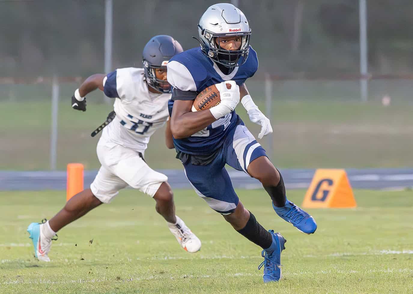 Central High’s, 14, Chris Hill finds running room in the game with visiting Wesley Chapel Friday at the Bear Den. Photo by [Joseph DiCristofalo]