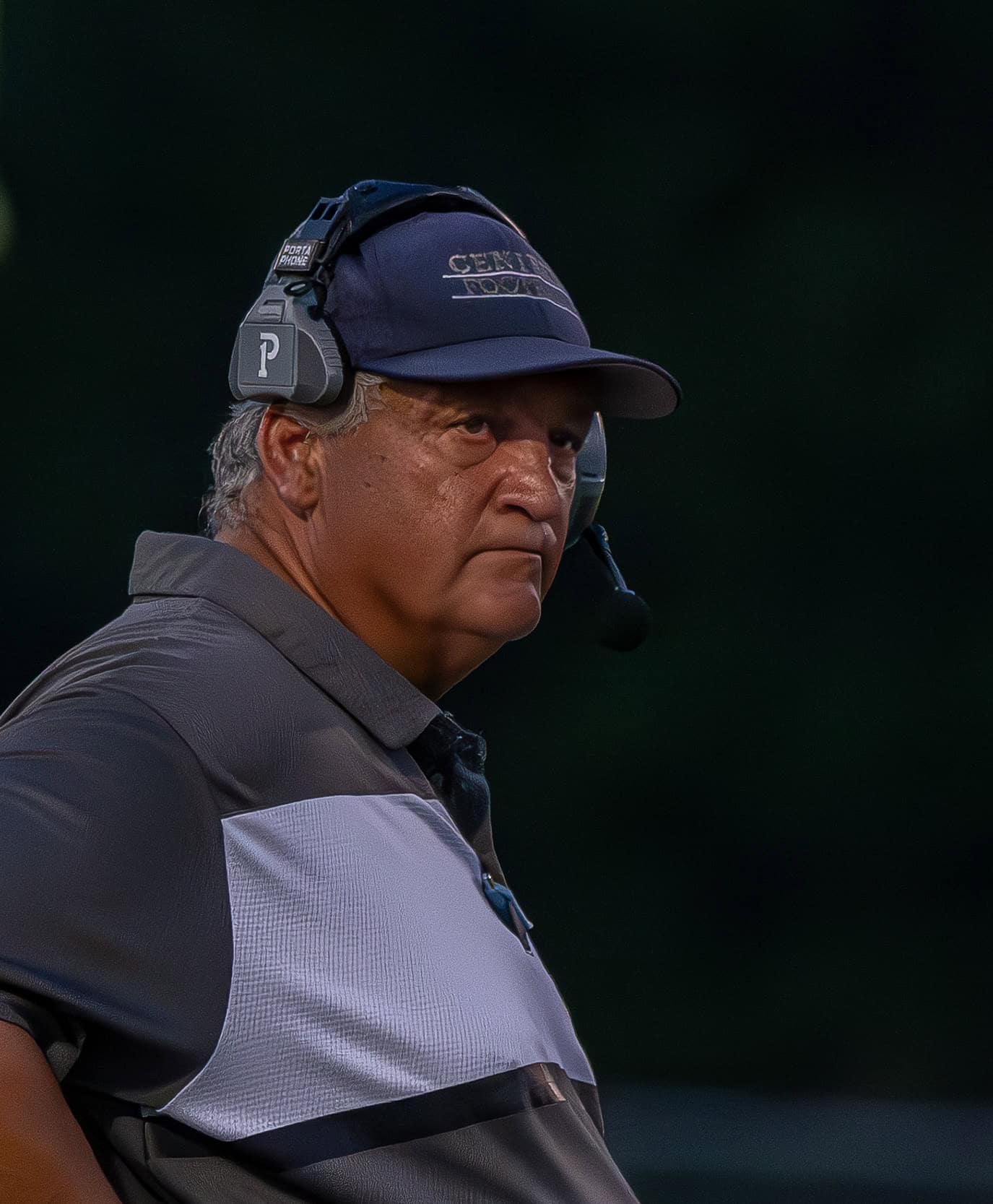Central High’s Head Coach, Jim Pusateri, checks the scoreboard during a time out in the game with visiting Wesley Chapel Friday at the Bear Den. Photo by [Joseph DiCristofalo]