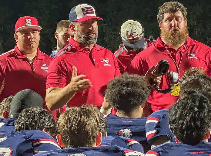 Springstead head coach Mike Garofano speaks to his players after Thursday's spring game against South Sumter at Booster Stadium. [Photo by Chris Bernhardt Jr.]