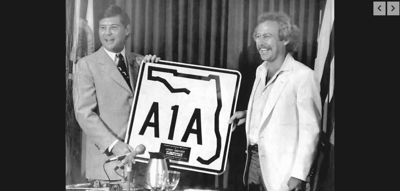 In 1981, Florida Governor Bob Graham presented Buffet with an A1A highway sign in recognition of his efforts to save Manatees. Photo: Florida Memory