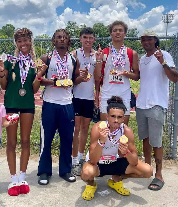 (From left to right) Deaijah Tullis, Chadiell Echevarria, Kason O'Neil, Jaxson Nichols, Coach Thomas Watson, and Xylus Pastrana (center) celebrate after their National Qualifier in Lake City. [Photo credit: Gina Espina]