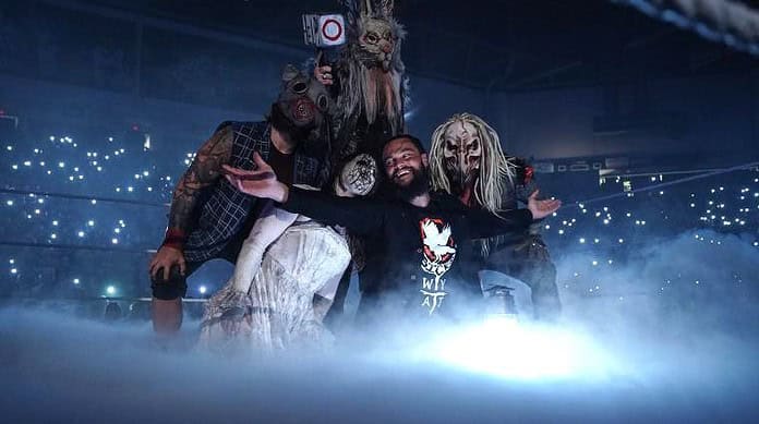Brooksville's Taylor Rotunda, known as Bo Dallas in the WWE, poses with his arms outstretched, surrounded by the rest of the members of the Wyatt Sicks during WWE Monday Night Raw on Monday in Dayton Ohio. [WWE.com]