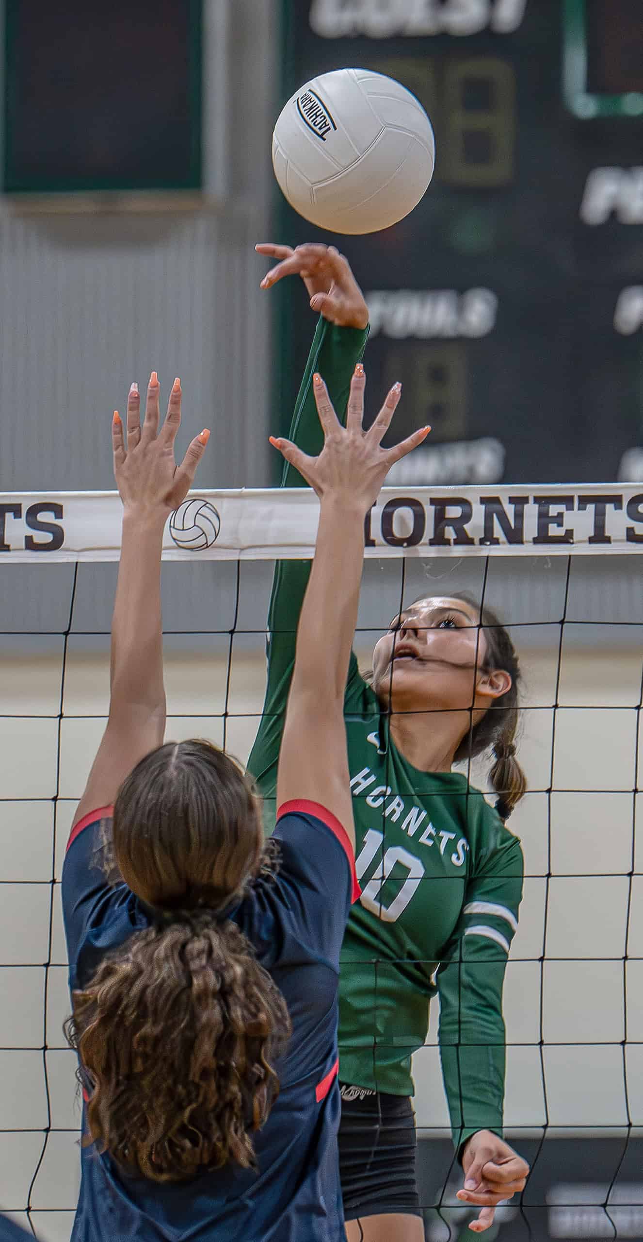 Weeki Wachee High, 10, Jadyn Aponte knocks down a Springstead High defender on Tuesday at Weeki Wachee High. (Photo by JOE DiCRISTOFALO)