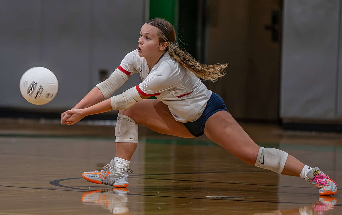 Springstead High, 2, libero, Kiersten Caamano stretches to defend a serve during play against Weeki Wachee High on Tuesday. (Photo by Joe DiCristofalo)