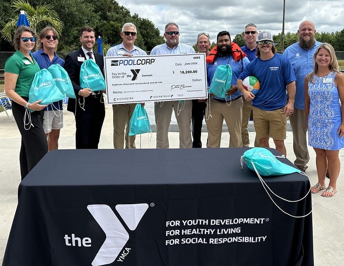 Poolcorp presents check to YMCA of the Suncoast [Courtesy photo]