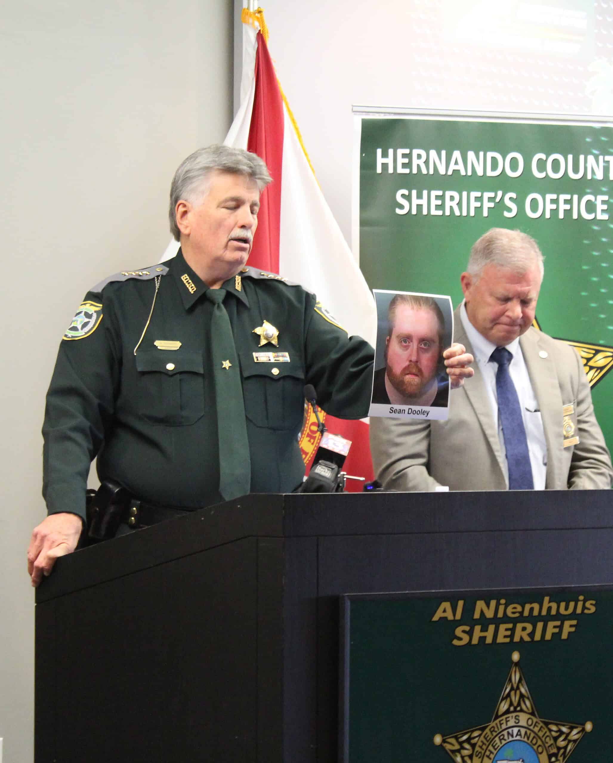 Sheriff Al Nienhuis discusses the charges for one of the arrested individuals at Thursday's press conference. [Hernando Sun Staff]