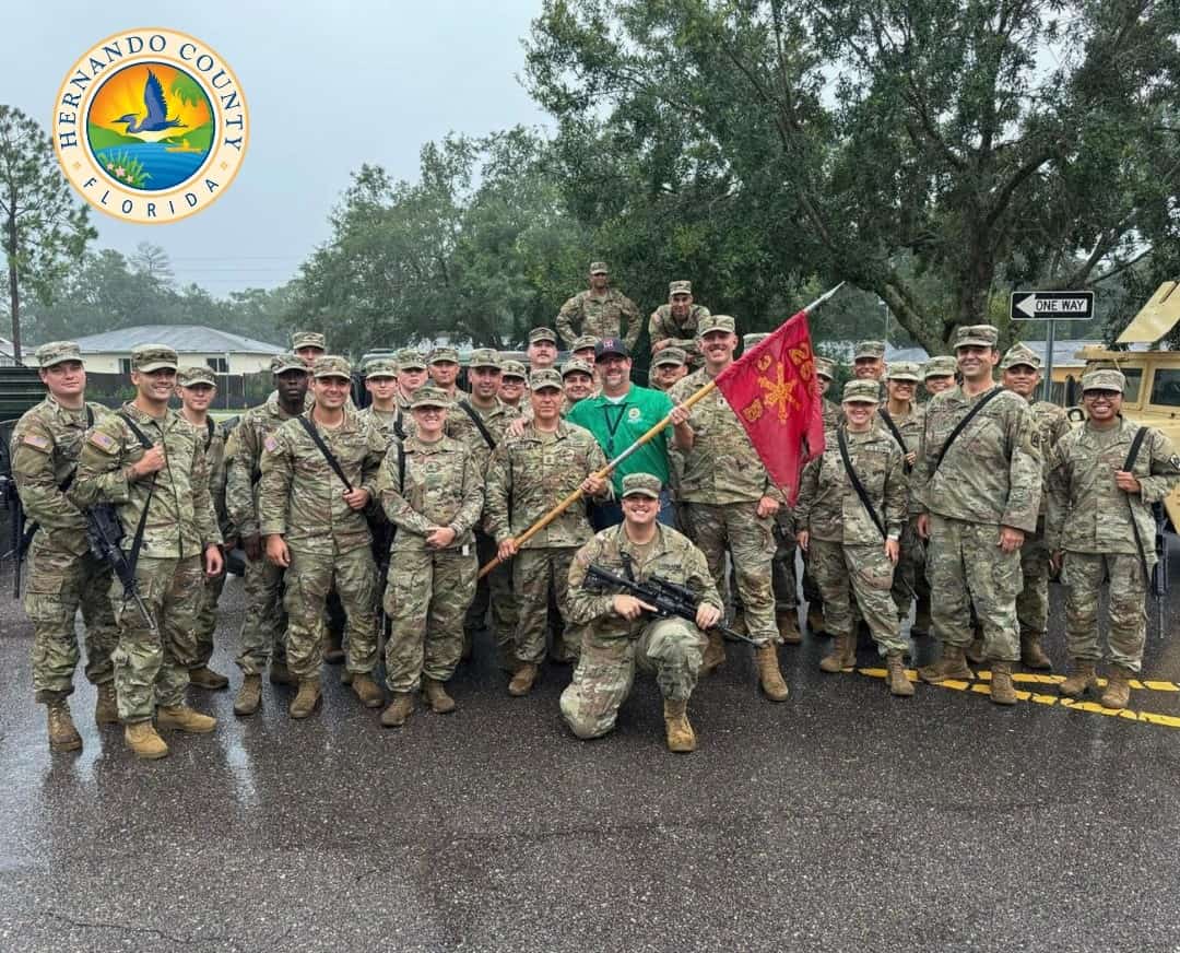 The National Guard 3rd Battalion 265 Air Defense Artillery out of Fort Myers assisted vulnerable areas in Hernando County during the storm. BOCC Vice Chairman Brian Hawkins, center in green shirt. [Credit: Hernando County Gov]