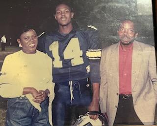 Tyrone on Senior Night at Central with mother Lawanna Goodson Riggins and step father Samuel Riggins. [Photo Courtesy of Tyrone Goodson]