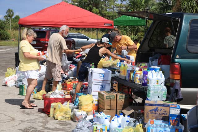 A community-driven distribution point was organized on social media by local residents. [Credit: Mark Stone]