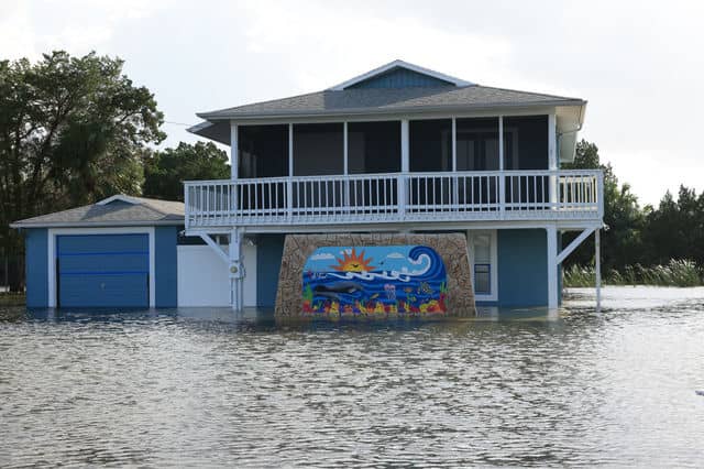 Water remained on the streets of Hernando Beach long after the storm passed. [Credit: Mark Stone]