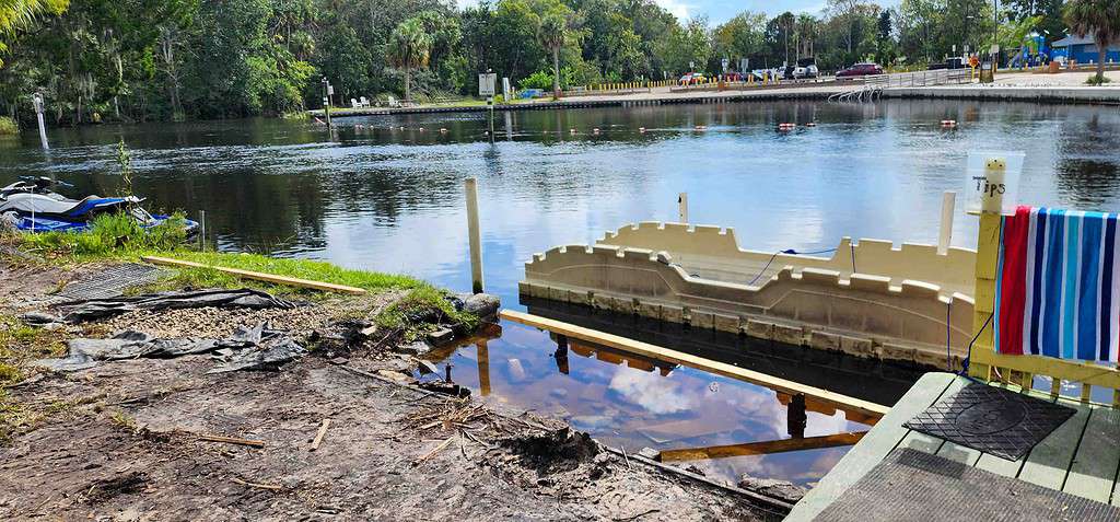 Mud stands where the Kayak Shack dock used to be on the Weeki Wachee River. [Credit: Mark Stone]