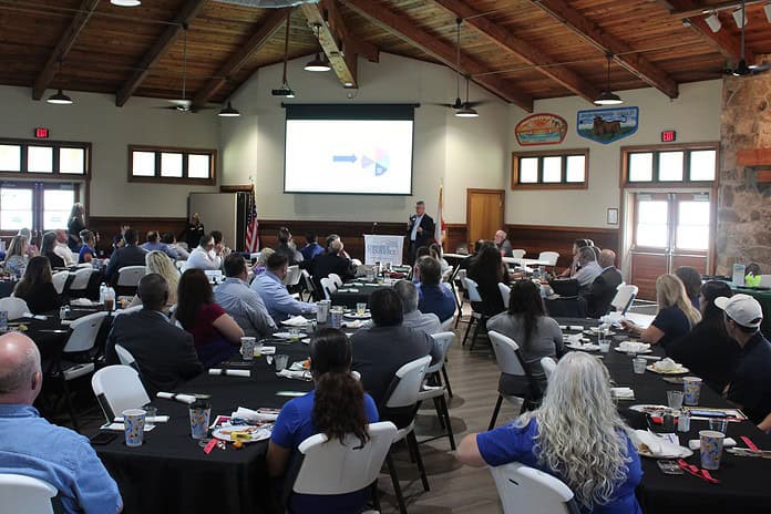 Senior Director of CFTB Chuck Tiernan speaks to the gathered crowd of Chamber members on Wednesday. [Photo by Austyn Szempruch]