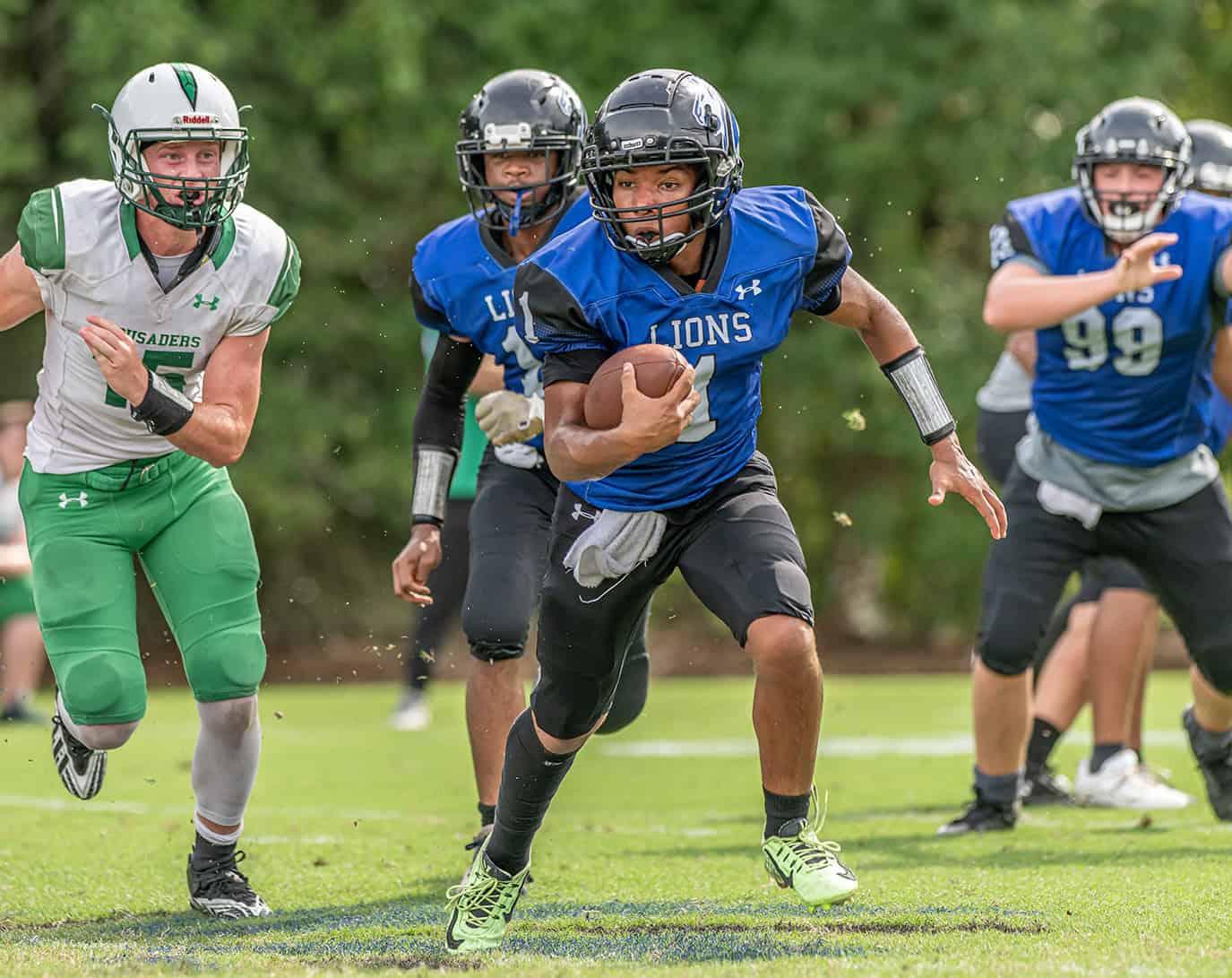 Hernando Christian Academy QB, 1, Jaden Montzka finds room to run against visiting Ocala Christian Friday afternoon in Brooksville. [Photo by Joe DiCristofalo]