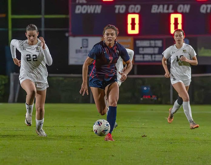 FILE PHOTO- Springstead High, 7, Ava Kanaar gets behind the Buchholz High defense to score one of her six goals in the 6A District 4 semi-final game in Spring Hill, January 2024.. [Credit: Joe DiCristofalo]