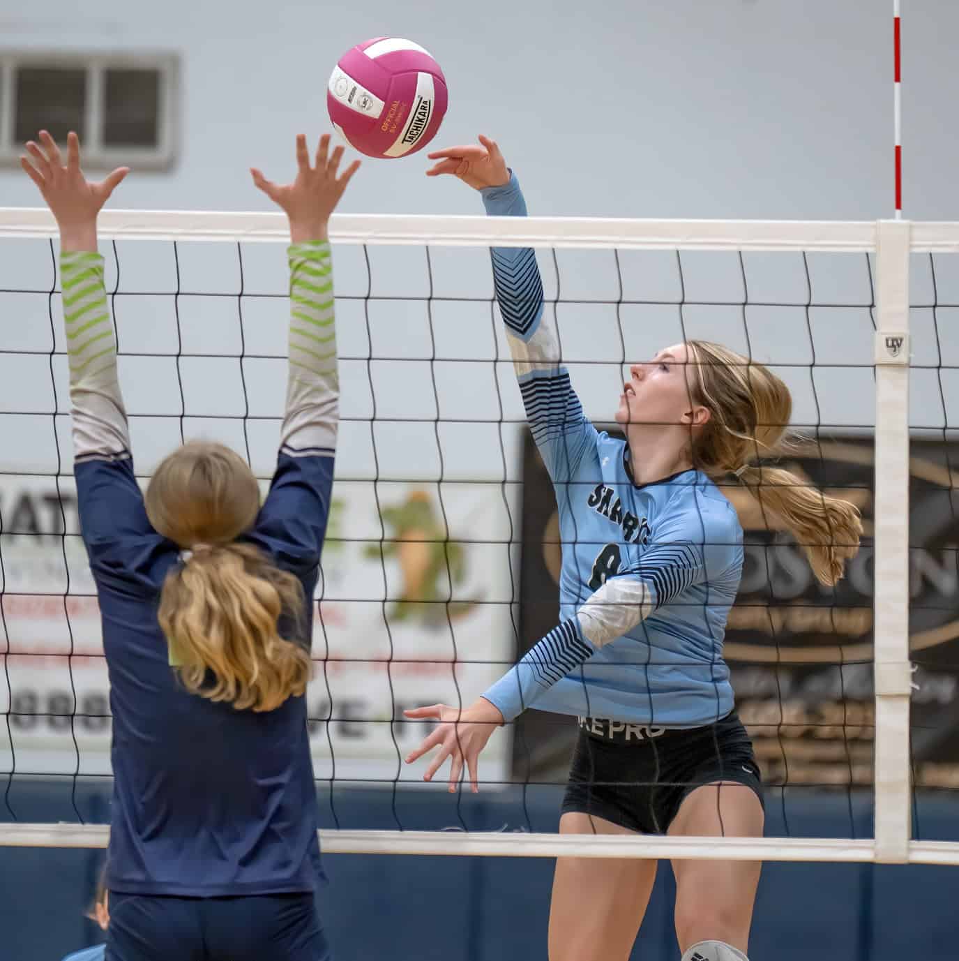 Nature Coast Tech, 8, Addy Carpenter sends a cross court shot in the match at Central High. [Photo by Joe DiCristofalo]