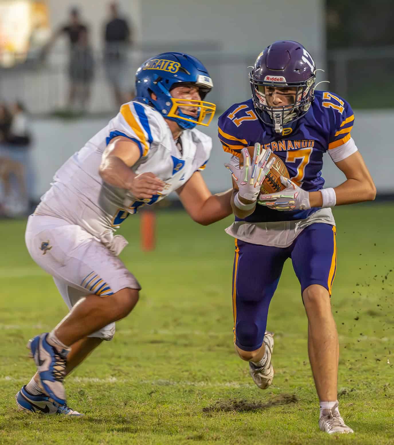 Hernando High , 17,  Nathan Blomberg runs after catching a pass in the game with  Crystal River High School Friday night in Brooksville. [Photo by Joe DiCristofalo]