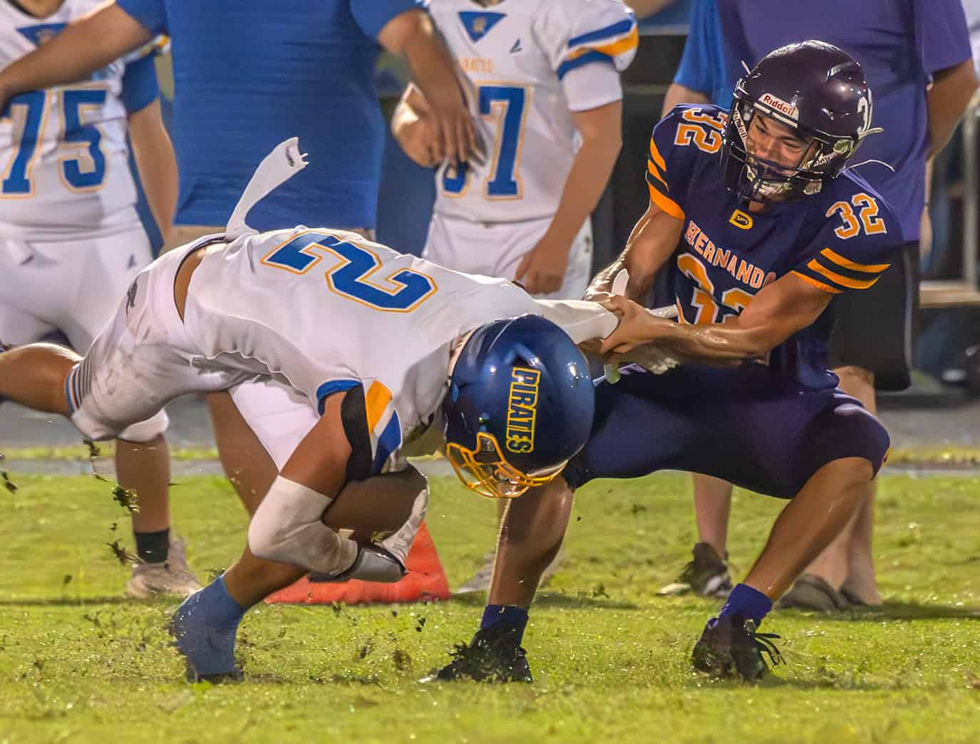 Hernando High , 32, Stevontae Hasberry pulls down Crystal River High , 2, Eric Jenkins Friday night in Brooksville. [Photo by Joe DiCristofalo]