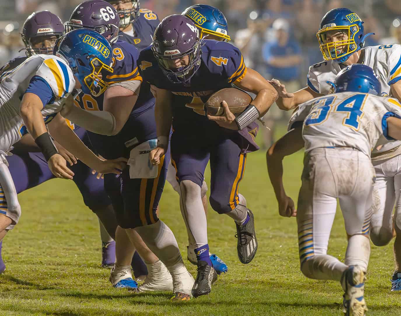 Hernando High, 4, Michael Saltsman attempted to exploit a hole in the Crystal River High defense Friday night in Brooksville. [Photo by Joe DiCristofalo]