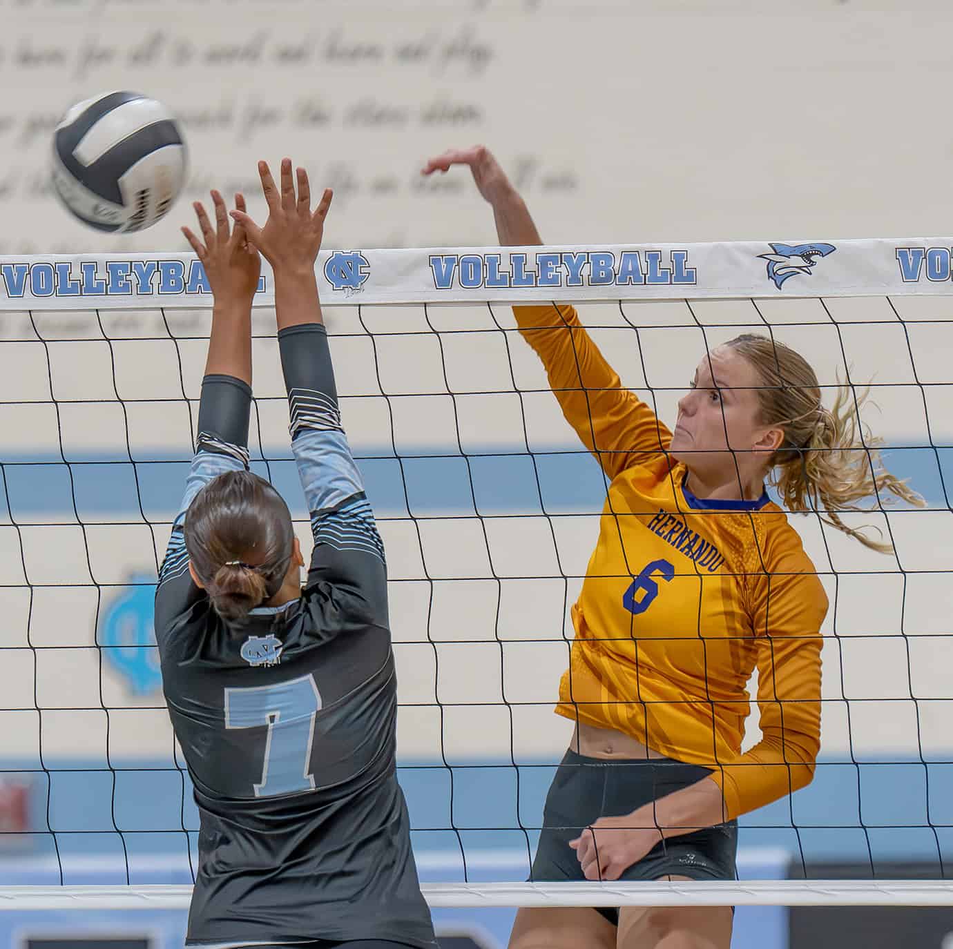 Hernando High, 6, Kaiya Ward hits cross court against Nature Coast Tech ,7, Amanda Tirado Wednesday at NCT.  [Photo by Joe DiCristofalo]