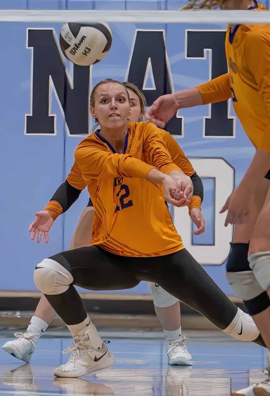 Hernando High, 12, Bailey Poe digs a serve in the match with Nature Coast Tech Wednesday at NCT.  [Photo by Joe DiCristofalo]