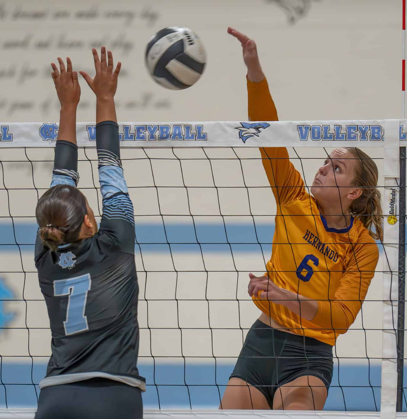 Hernando High, 6, Kaiya Ward hits cross court against Nature Coast Tech ,7, Amanda Tirado Wednesday at NCT.  [Photo by Joe DiCristofalo]