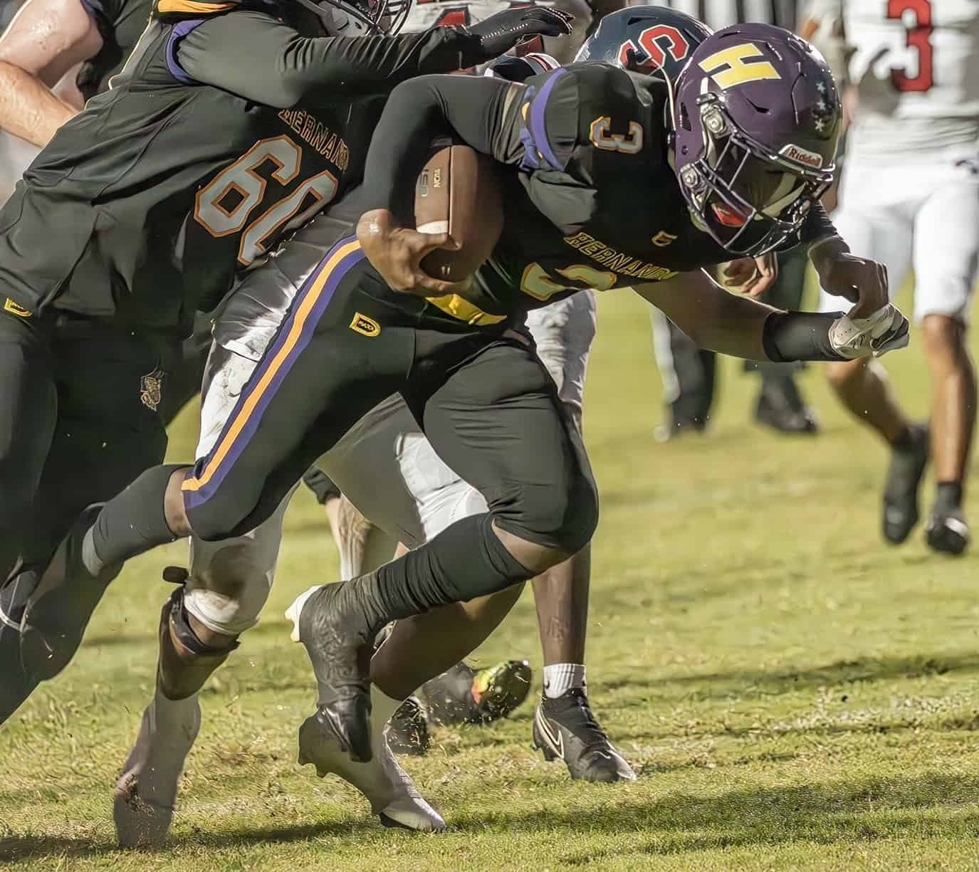 Hernando High, 3, Jerry Brown lunges for a touchdown against Springstead High Friday in Brooksville. Photo by [Joseph DiCristofalo]