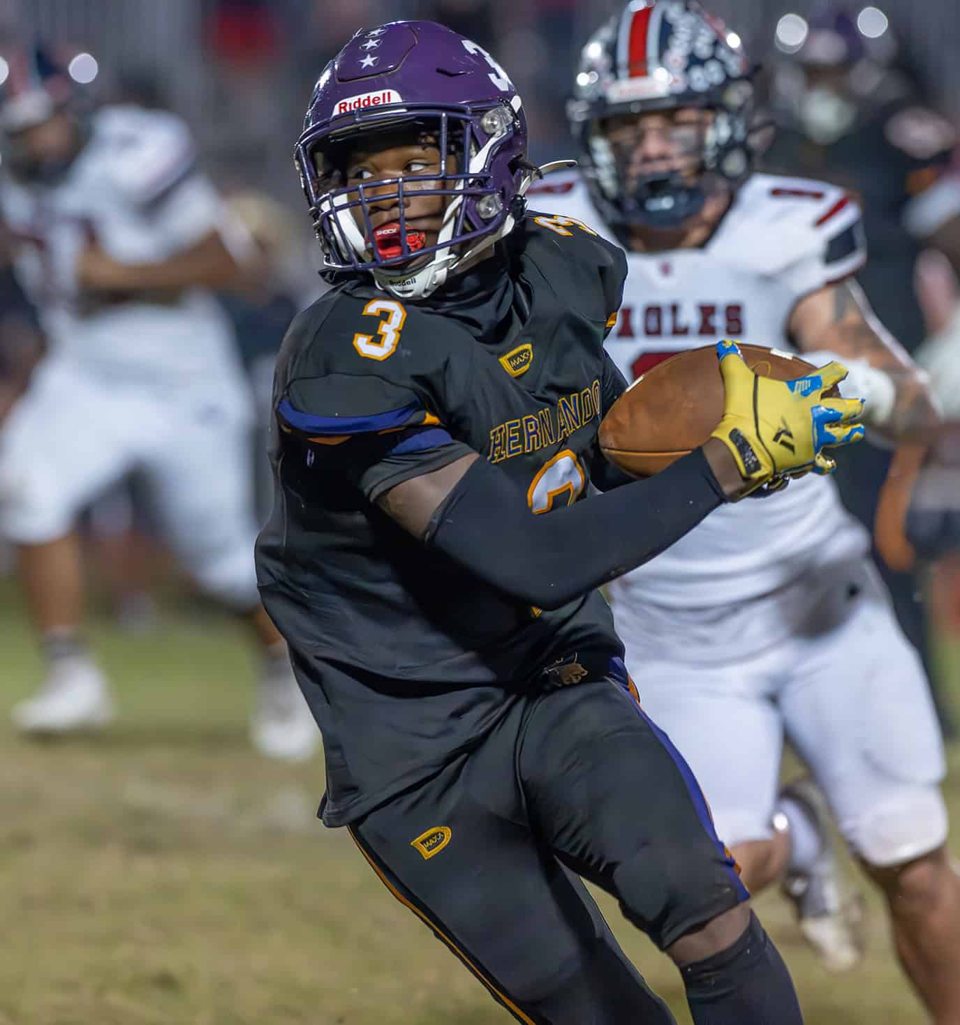 Hernando High, 3, Jerry Brown turns up field after a catch on the sideline in the game with Springstead High Friday at Tom Fisher stadium. [Photo by Joe DiCristofalo]