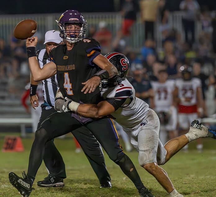 Springstead High, 5, Jadon Jaimes disrupts Hernando QB Michael Saltsman resulting in a fumble during the 