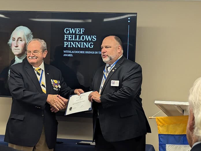 Jim Gaskins, president Florida Society Sons of the American Revolution, presents the GWEF Fellows Award to Steve Homan, president Sons of the American Revolution Withlacoochee Chapter. [Credit: Rocco Maglio]