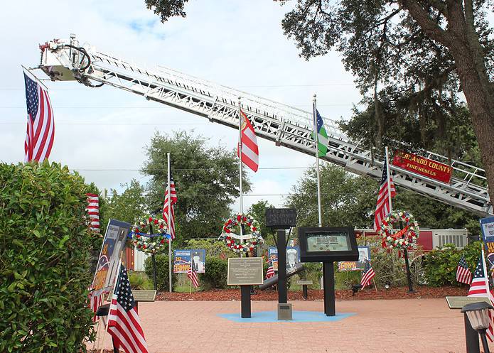 Wreaths were presented for the fallen at Wednesday's 9/11 remembrance. [Photo by Austyn Szempruch]