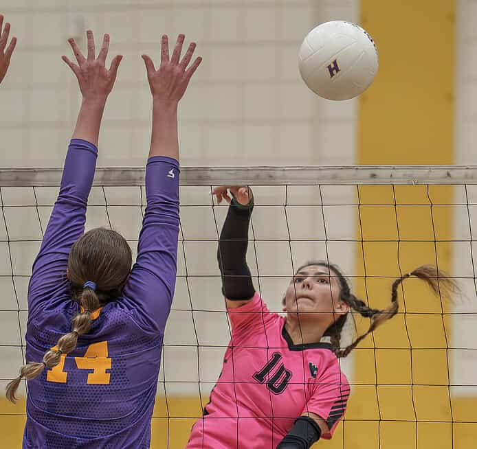 Weeki Wachee High, 10, Jadyn Aponte sends a shot past the defense by Hernando High, 14, Lillian Jernigan in the 4A District 8 playoff against Hernando High. [Photo by Joe DiCristofalo]