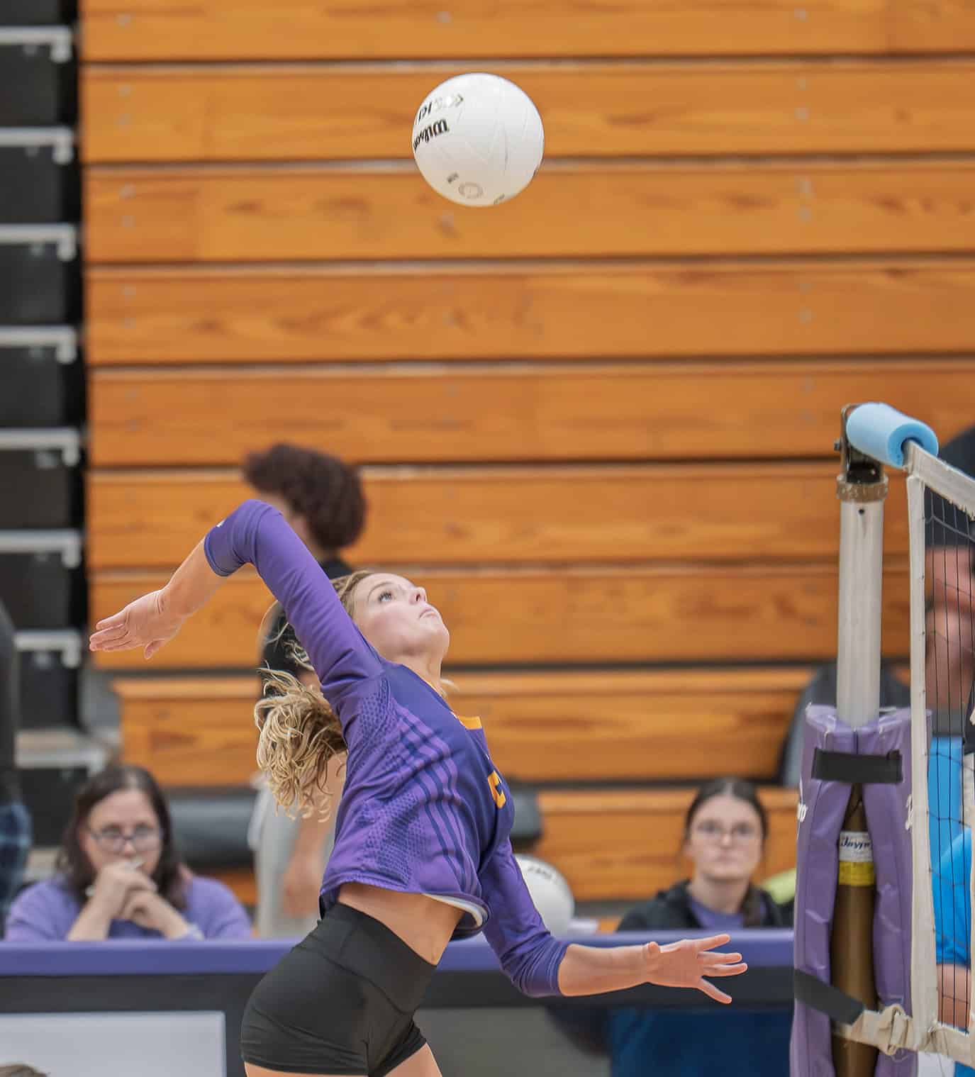 Hernando High, 6, Kaiya Ward elevates for a kill shot in the 4A District 8 playoff match against Weeki Wachee High. [Photo by Joe DiCristofalo]