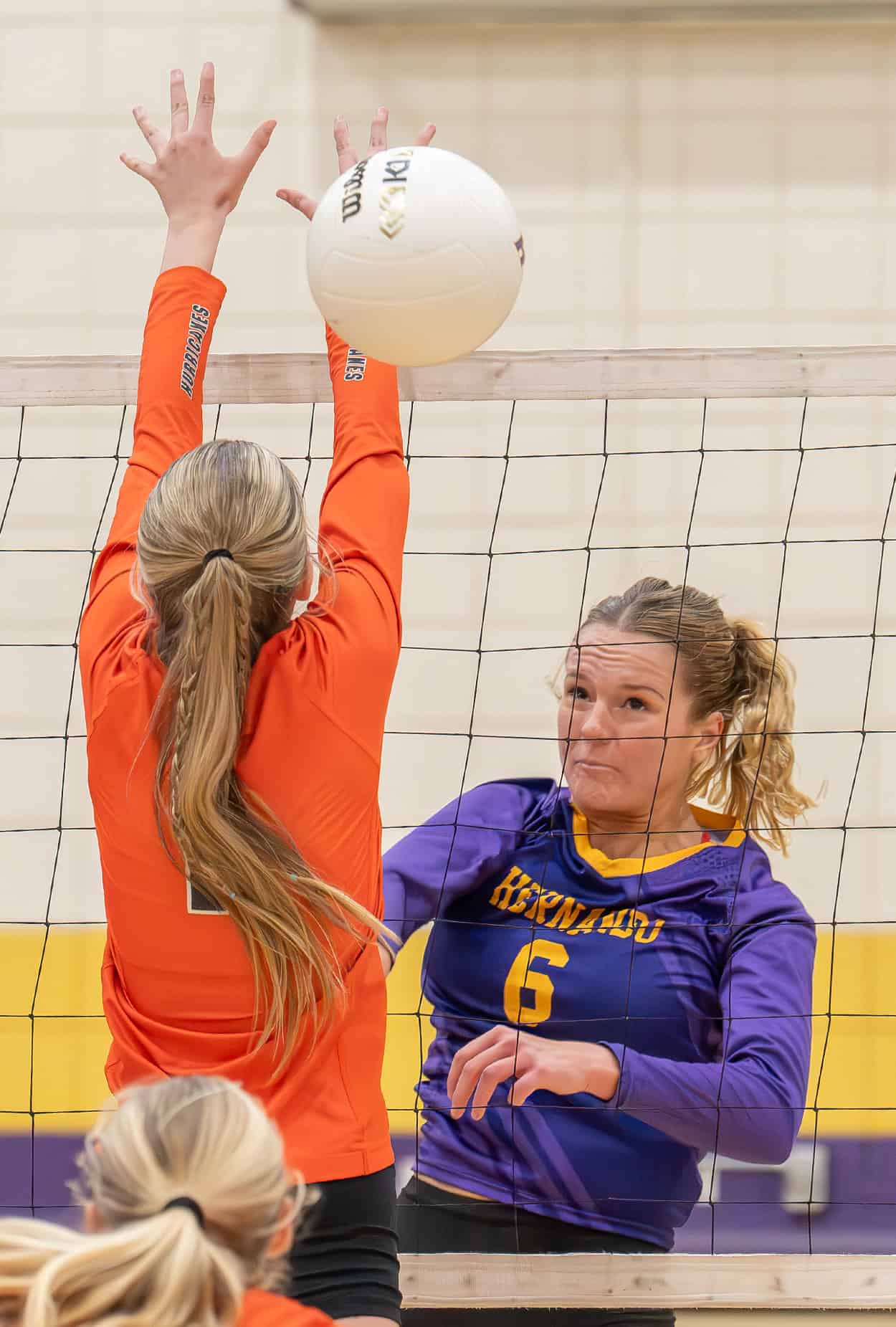 Hernando High ,6, Kaiya Ward watches her kill attempt get past a  Mt Dora High School defender in the 4A region quarterfinal match. [Photo by Joe DiCristofalo]