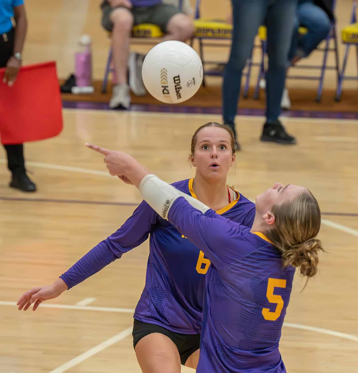 Hernando High ,6, Kaiya Ward watches as ,5, Katie Charlow returns a volley in the 4A region quarterfinal match with visiting Mt Dora High School Wednesday in Brooksville. [Photo by Joe DiCristofalo]