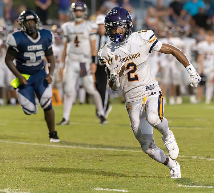 Hernando High, 2, Gabriel Sansone runs around end for a gain versus Central High. [Photo by Joe DiCristofalo]