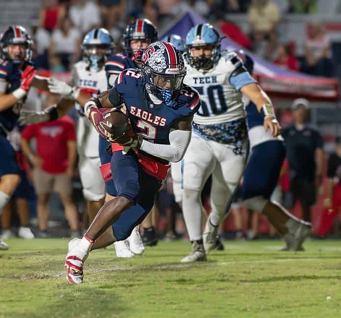 Springstead, 2, Tyree Davis runs around end for a gain in the game with Nature Coast Tech Friday at Booster Stadium. [Photo by Joseph DiCristofalo]