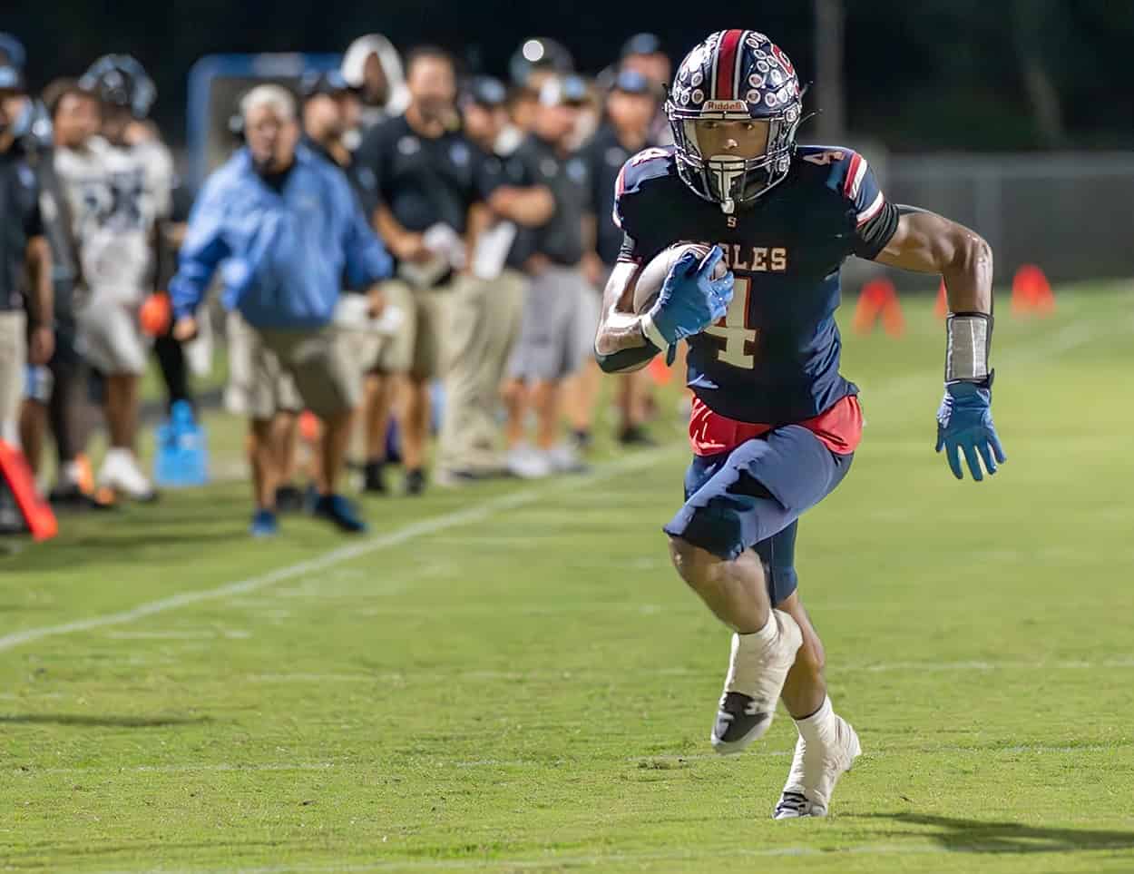 Springstead, 4, Connor McCazzio runs for a touchdown against visiting Nature Coast Tech Friday at Booster Stadium. [Photo by Joseph DiCristofalo]