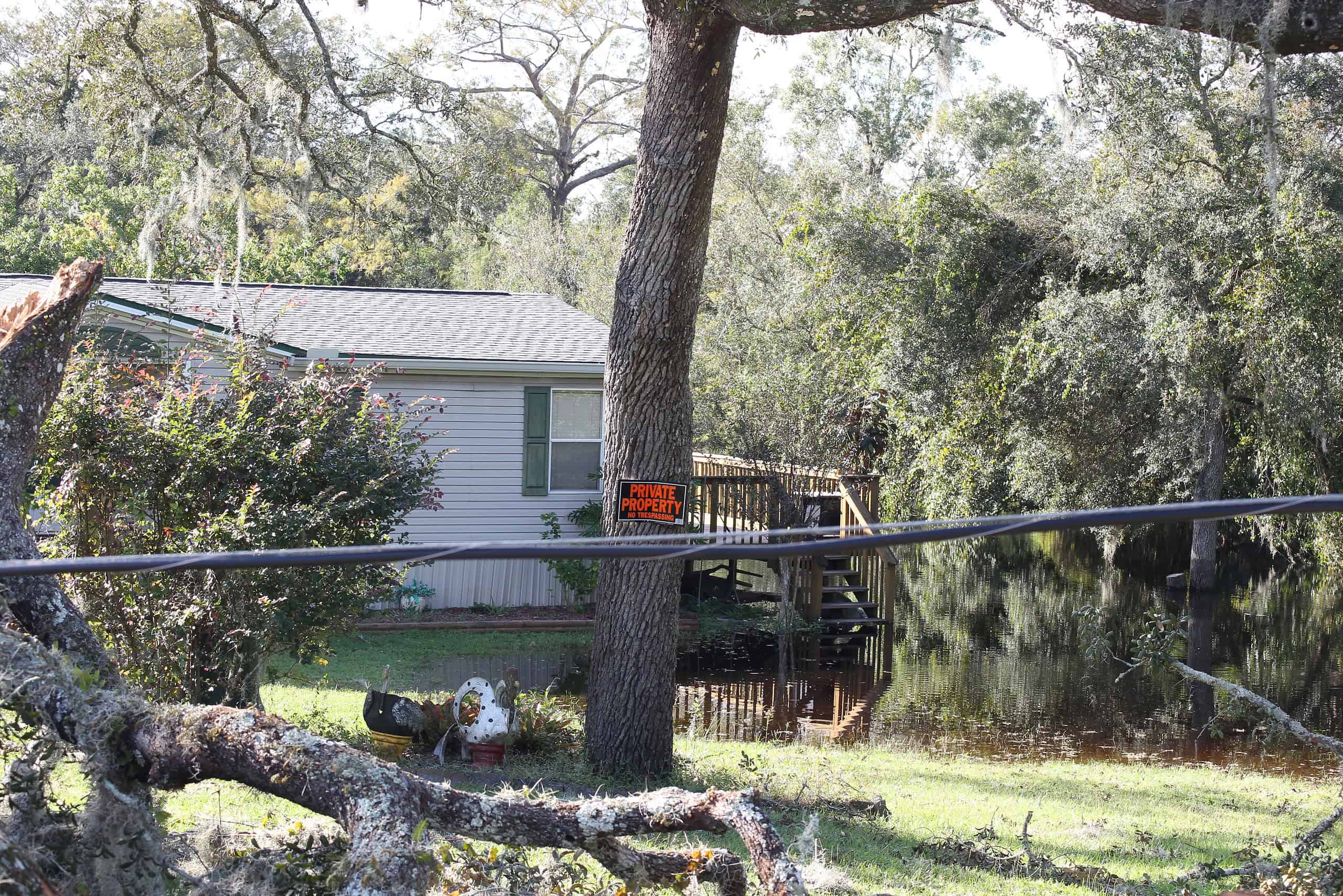 Flooding from the Withlacoochee River steals a home’s steps in Ridge Manor, Fla., on Saturday, October 12, 2024. [Photo by Hanna Maglio]