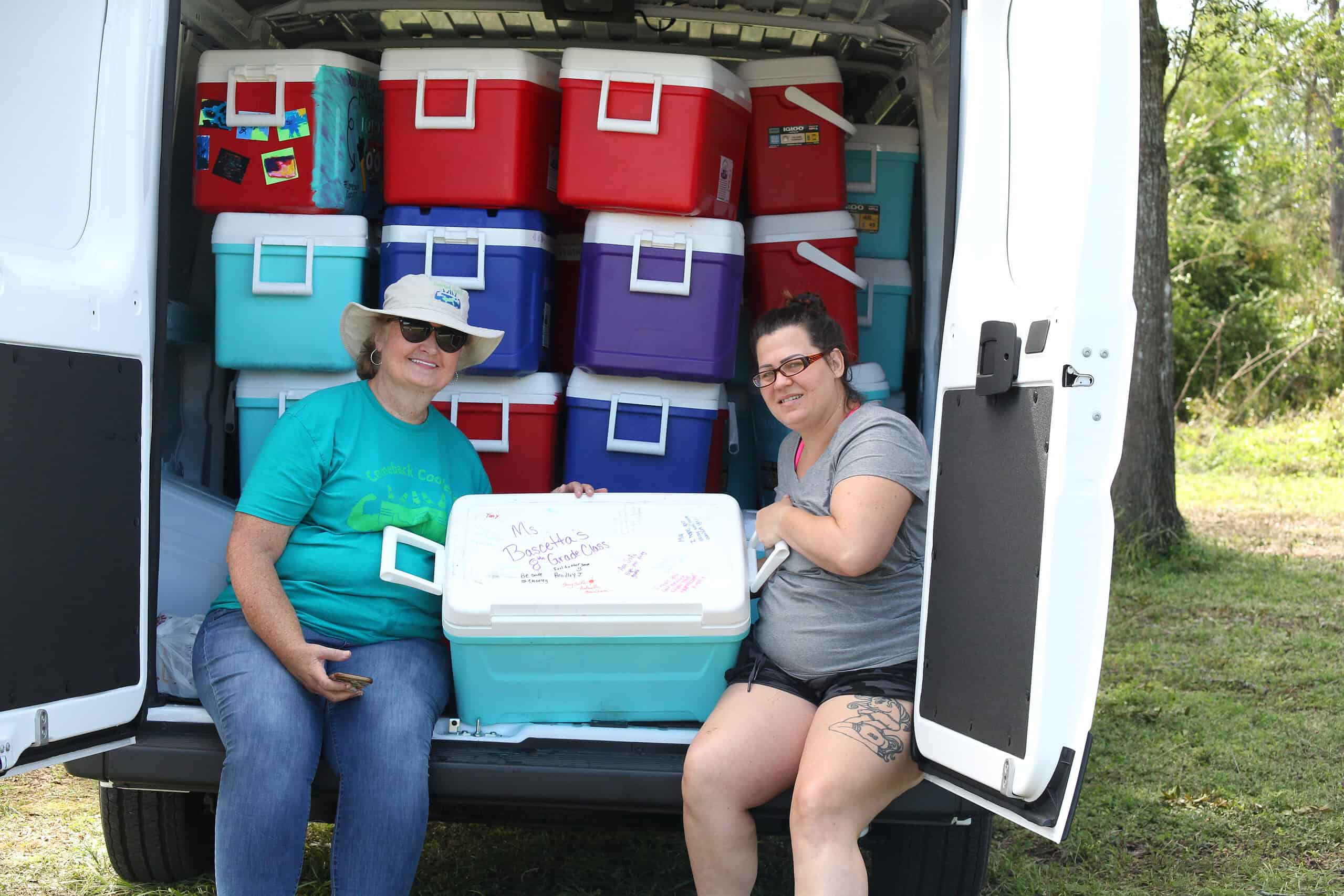 Martha Mills (left) from Comeback Coolers gives a cooler to Venessa Terry (right), who was getting sandbags to protect her home from flooding in Ridge Manor, Fla., on Saturday, October 12, 2024.
[Photo by Hanna Maglio]