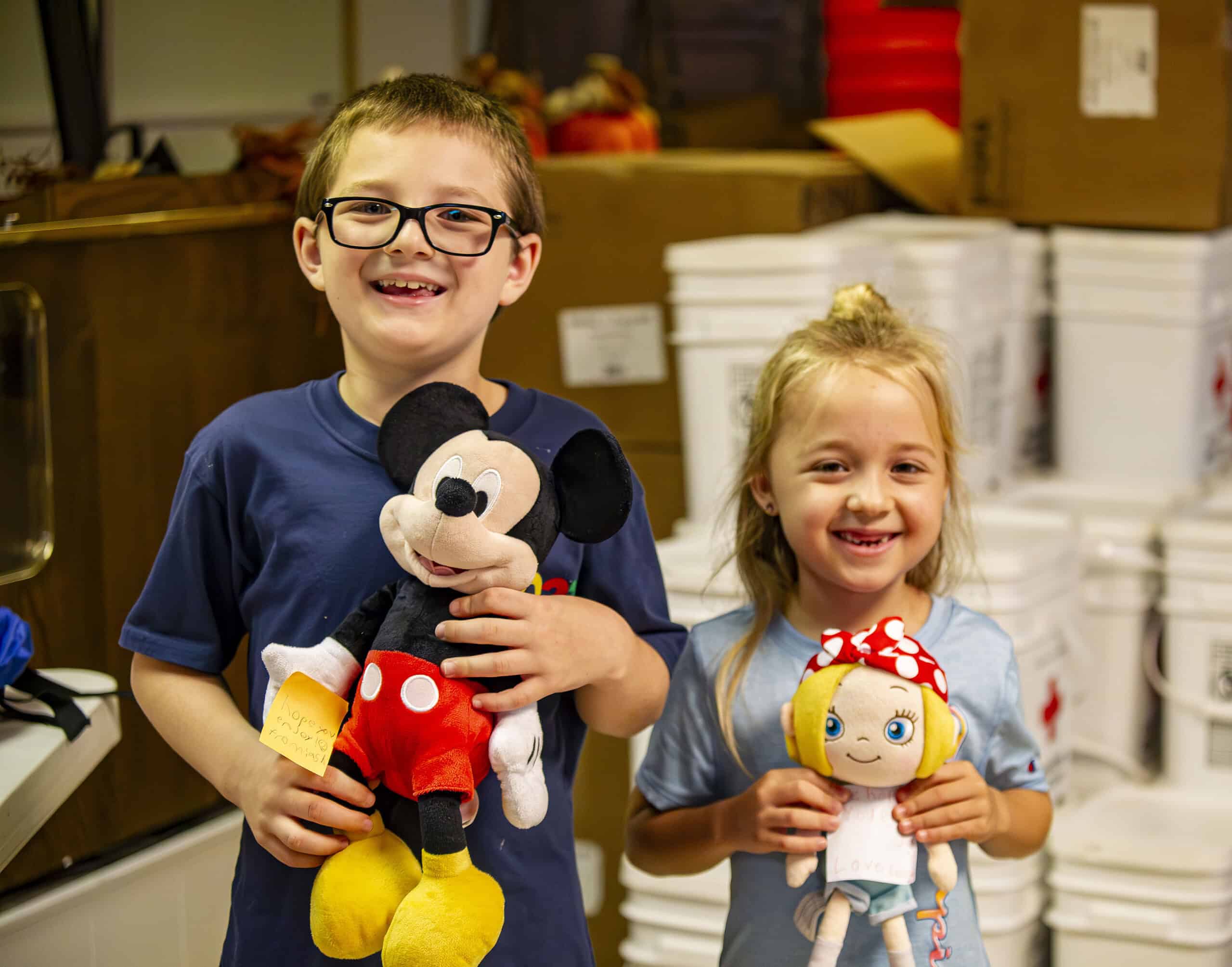 Ashton and Emily Spencer gave away their toys to children who lost their own. [Credit: Hanna Maglio]