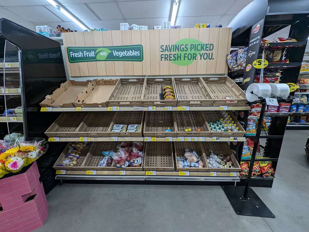 Empty shelves of fresh fruits and vegetables at Dollar General on Sherman Hills Boulevard. [Credit: Hanna Maglio]