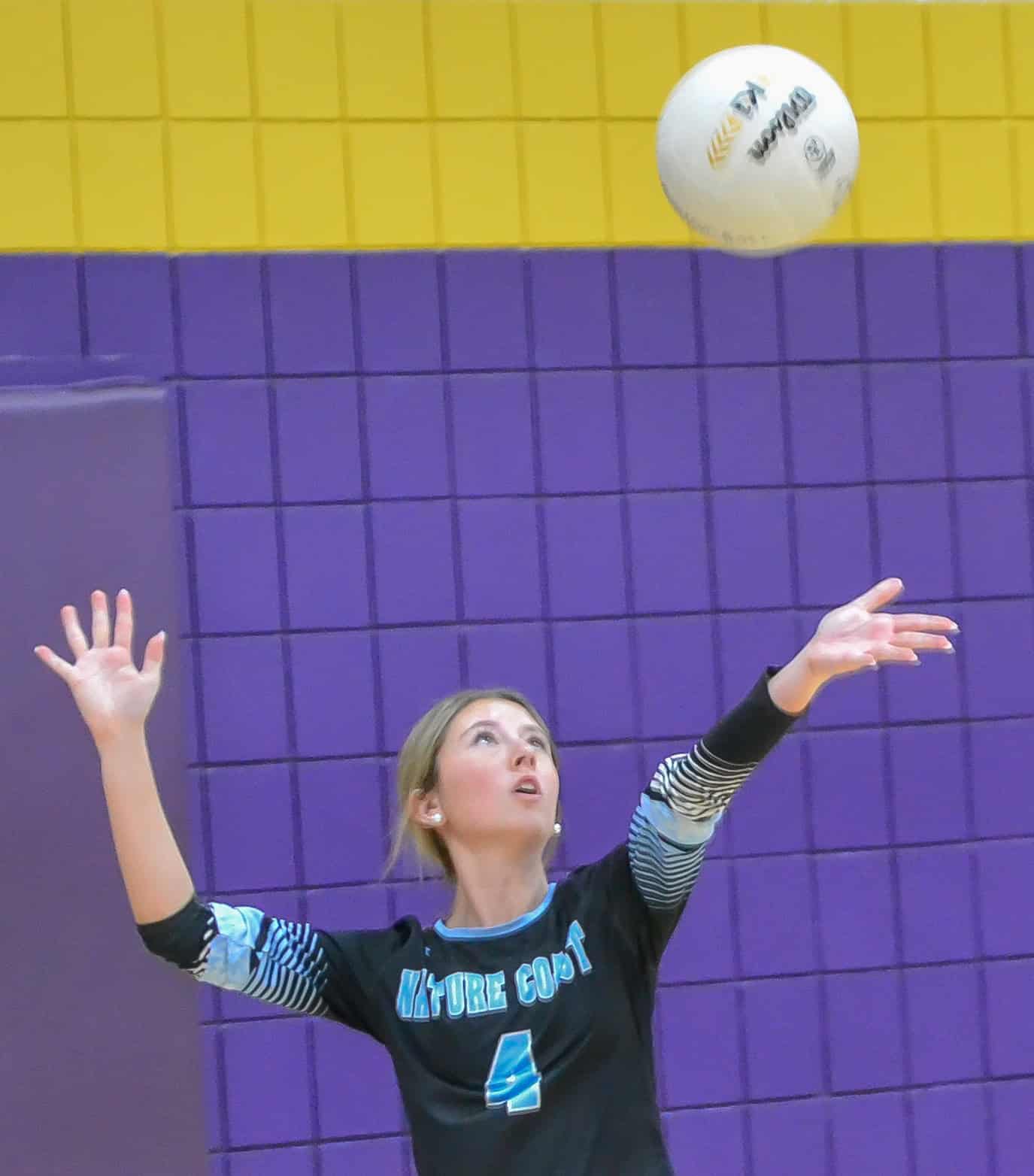 Adalei Harmon of Nature Coast serves against Hernando in the District 4A-8 Tournament final on Thursday at Hernando. [Credit: Chris Bernhardt Jr.]