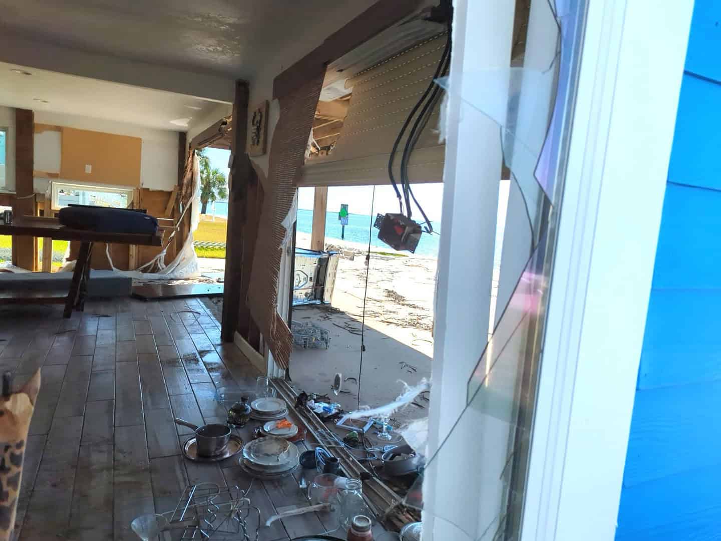 The view through the storm-shattered window of Brian Elferdink's home on Hernando Beach [Credit: Rocco Maglio]