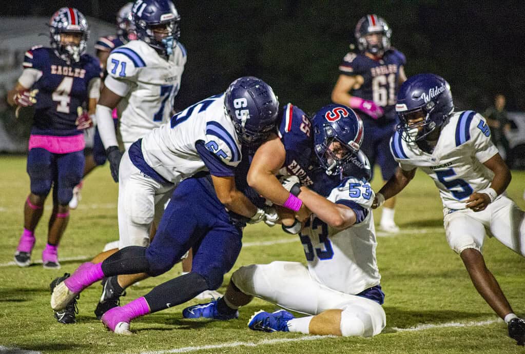 Wildcat players tackle Springstead player. (Photo by Hanna Maglio)