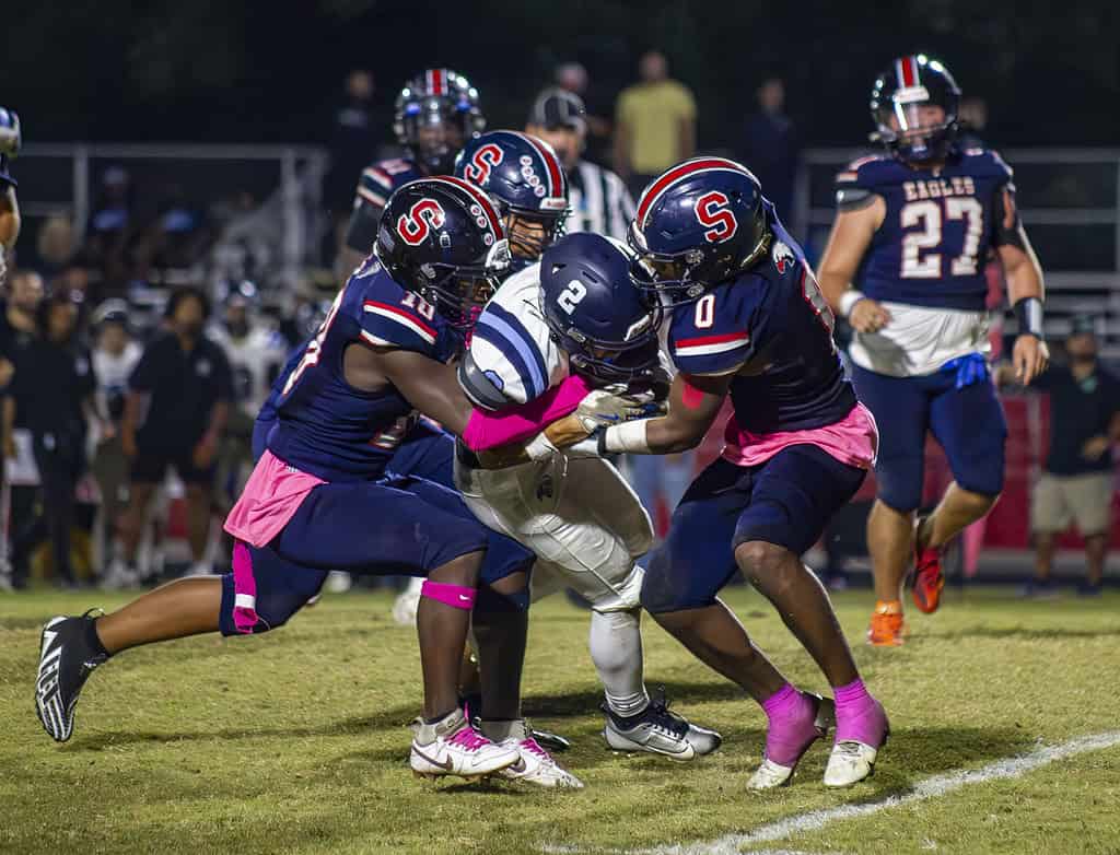 Springstead players tackling Wildcat's wide receiver Tj Aguilar. (Photo by Hanna Maglio)