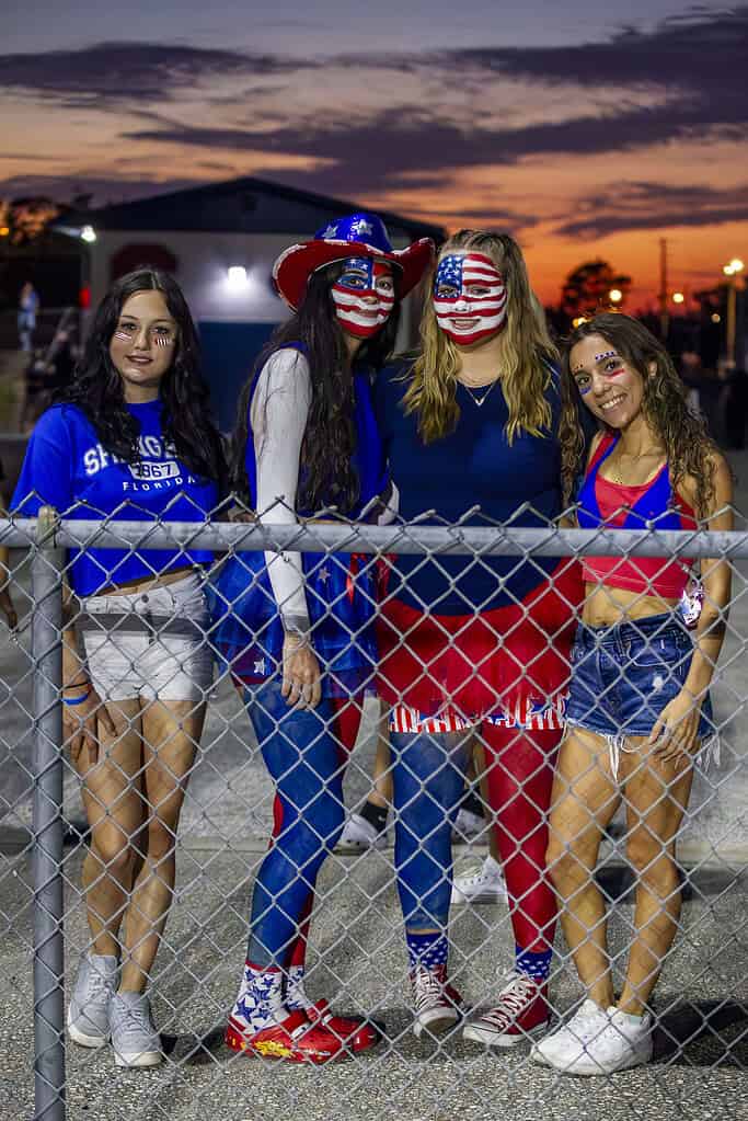 Valerie Sheridan, Lily Isaksen, Skylar Dono, and Gianna Bryan show off their school spirit for the HOCO football game. (Photo by Hanna Maglio)